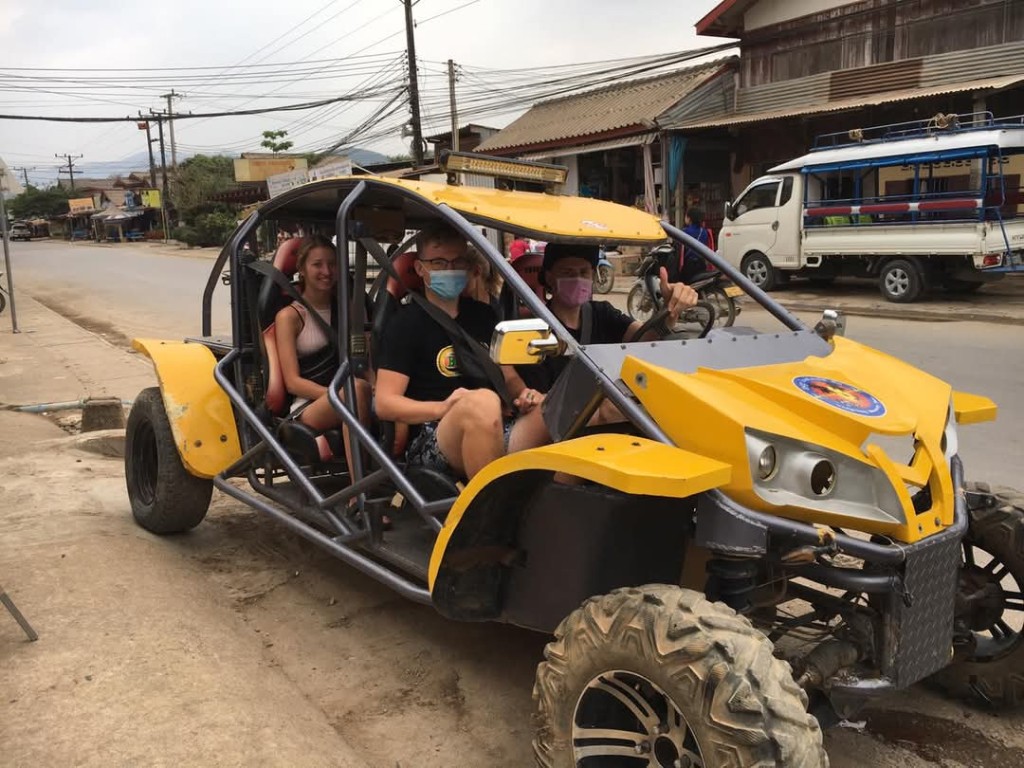 Yellow four-seater buggy ready for town adventure